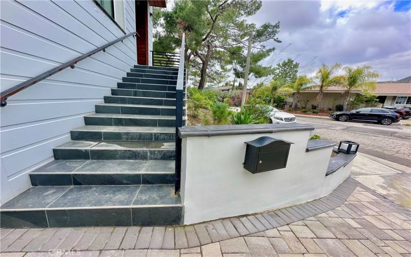 Front entry steps and private mailbox