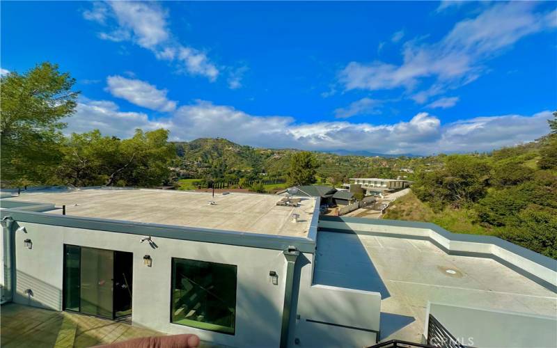 View from Backyard of the House and Rooftop Deck