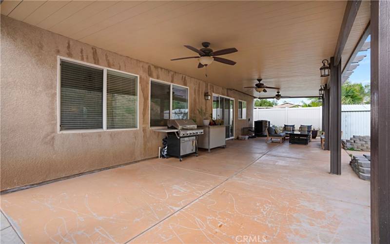 Huge & Spacious Backyard Covered Patio with 3 Remote Control Ceiling Fans.