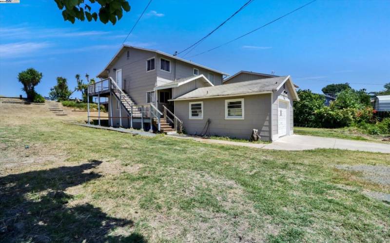 Stairs lead to first story unit & second story unit