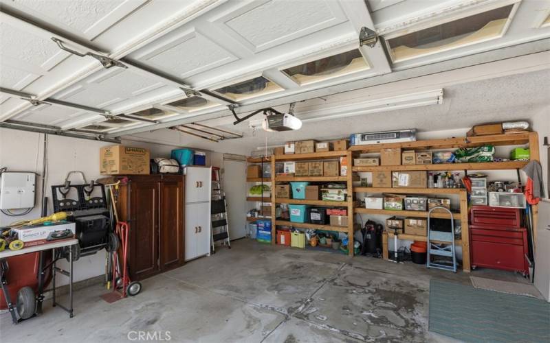 Spacious garage w/ shelves included