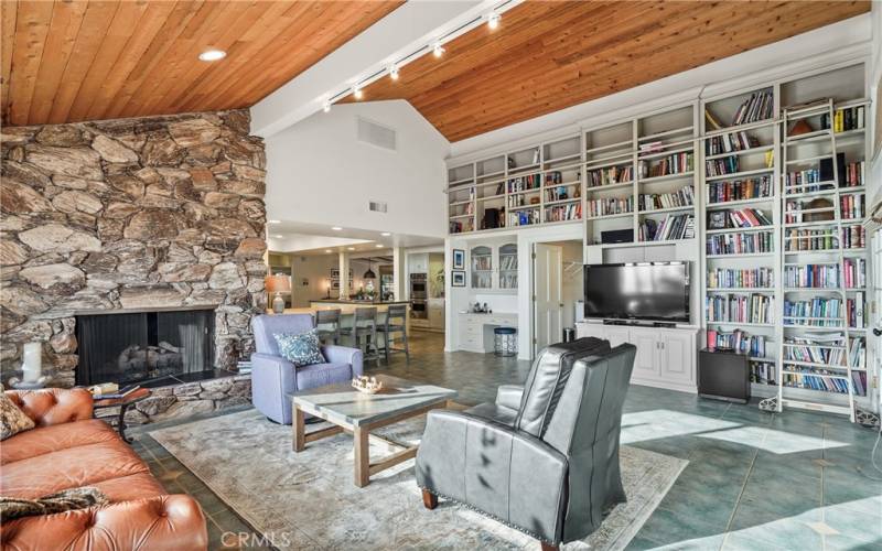 Family room w/ library wall...