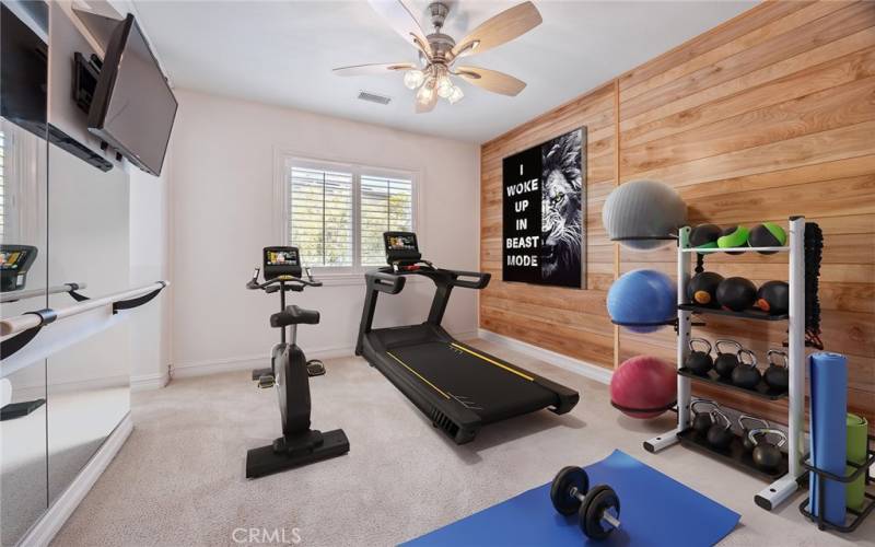Upstairs Exercise Room located off of Primary Suite - Virtually Staged