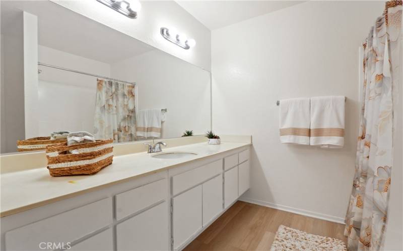 spacious bathroom with new flooring