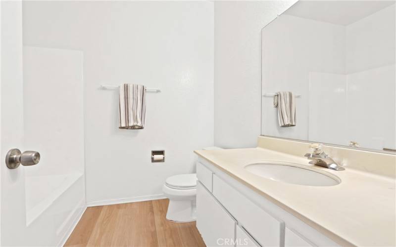 good sized bathroom with tub