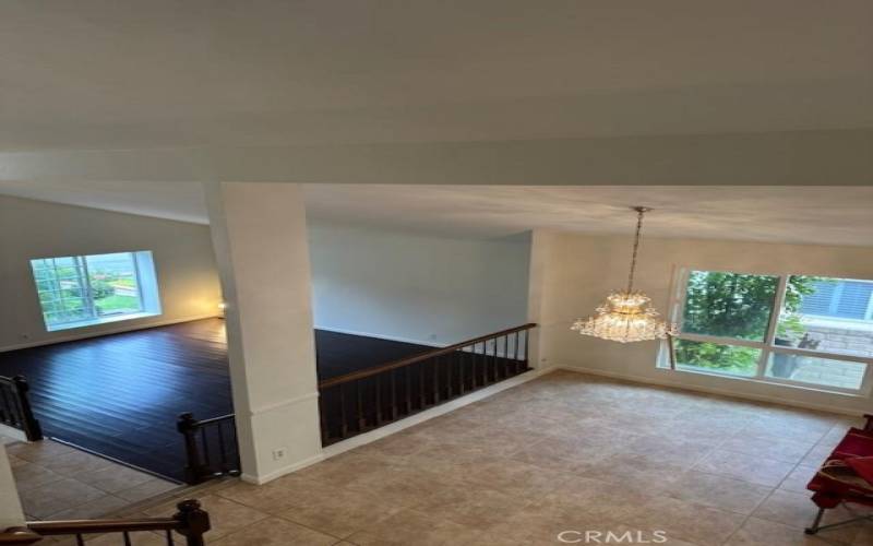 Family room with fireplace, wet bar and slider to back yard.