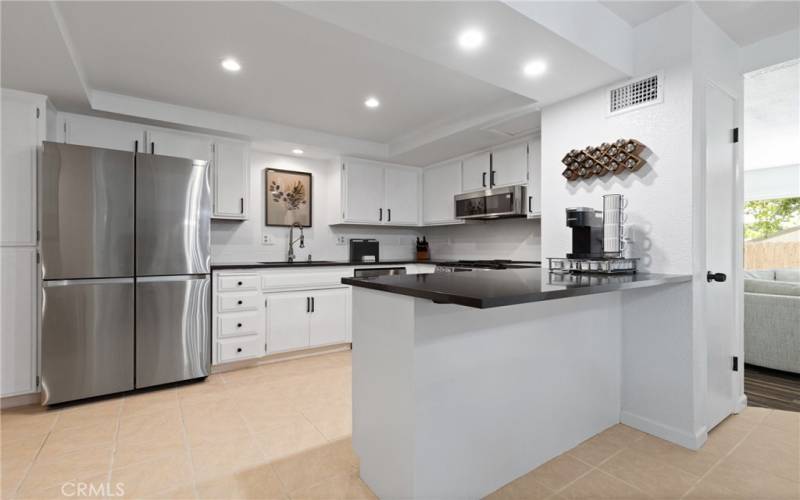 The kitchen underwent a remodel in 2023 which included quartz countertops and new appliances.