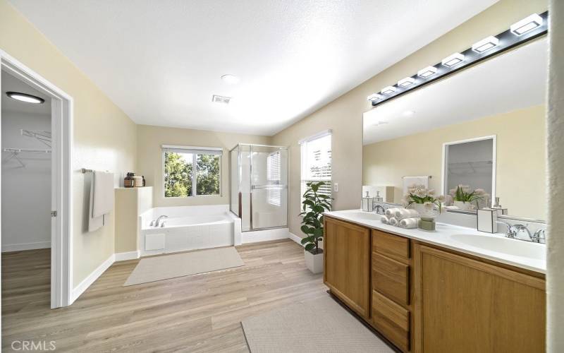 Primary suite bathroom (photo virtually staged)
