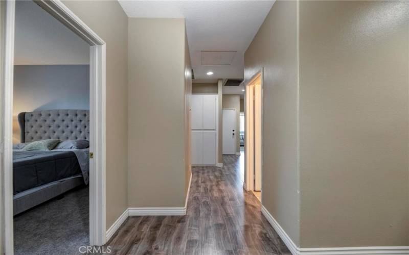 Hallway leading to the other bedrooms, laundry area and garage.