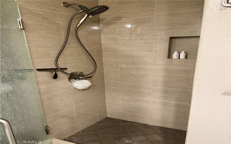 View of Hall Bath with Custom Walkin Shower.
