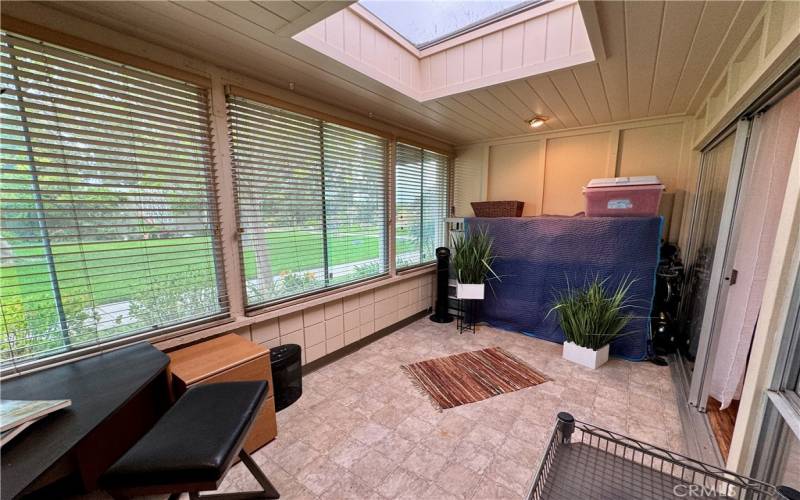 Enclosed Patio with Ceiling Skylight.