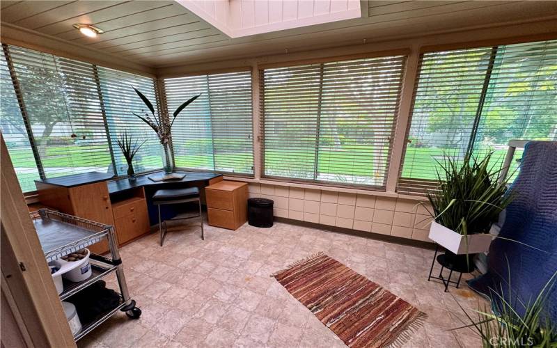 Enclosed Patio with ceiling Skylight.