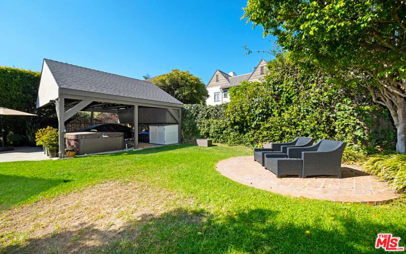 Backyard with view of carport