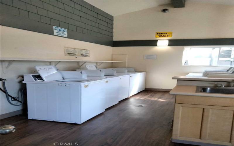 Laundry facility. HOA dues incl. water, trash, and the hot water heater!