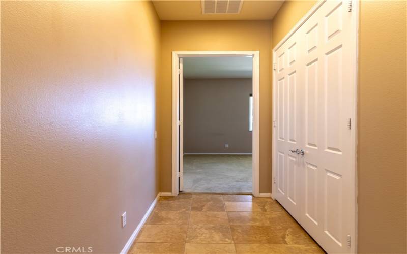 Hallway leading to bedroom.