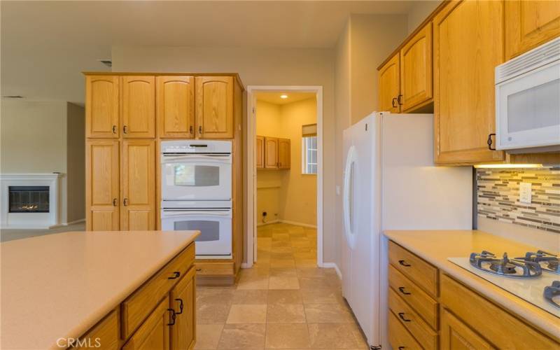 Kitchen area with view laundry.