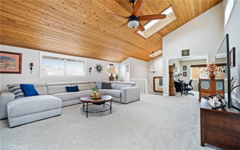 As you make your way upstairs, there is a large bonus room with carpet floors!
