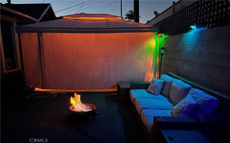 outdoor area at night with firepit