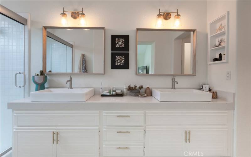 Main bathroom with new custom dual sinks, fixtures and mirrors.