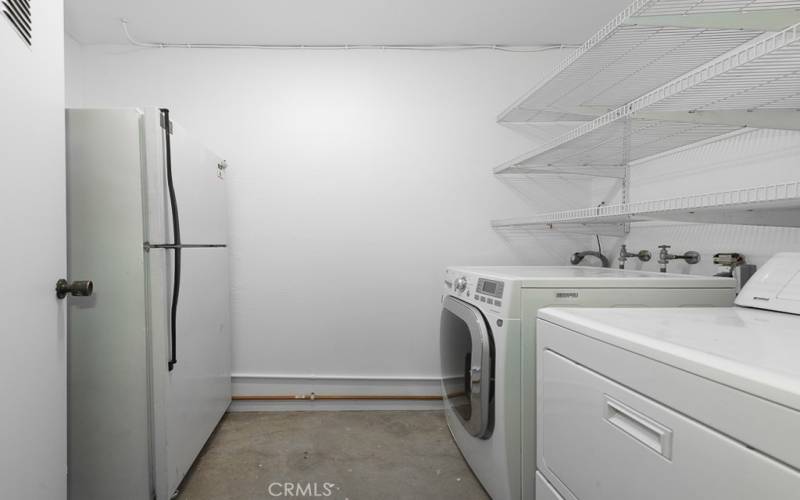 Laundry Room and Second Refrigerator in Garage