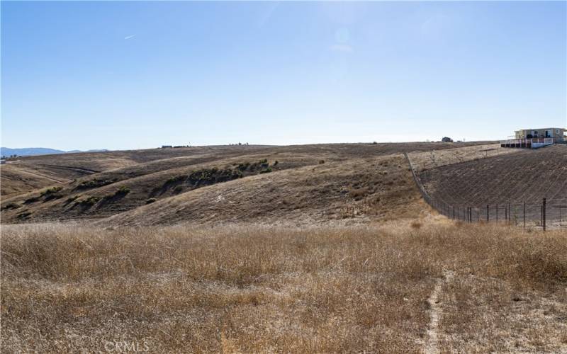 Looking Southeast from the NW Corner Area of the Property (property on left side of fence)