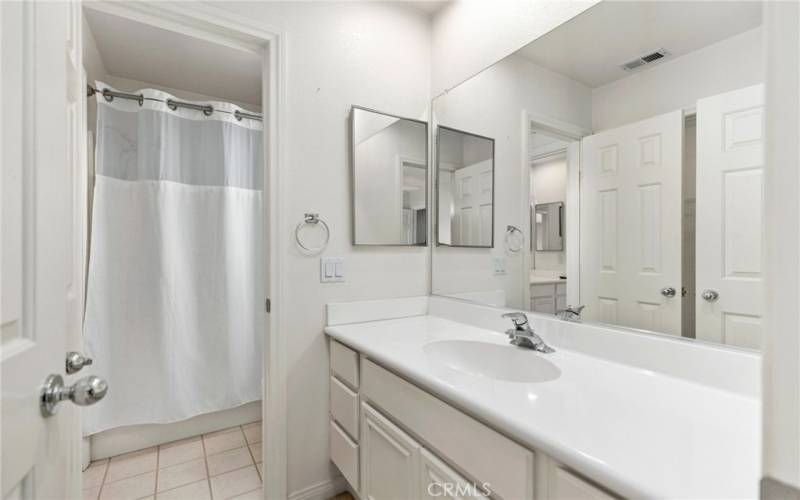 Secondary Bedrooms have individual vanity area with sink