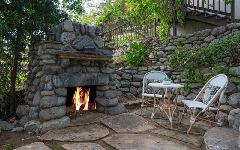 Original outdoor stone fireplace.