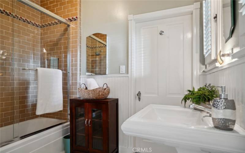 Handsome bathroom for lower level guest suite.