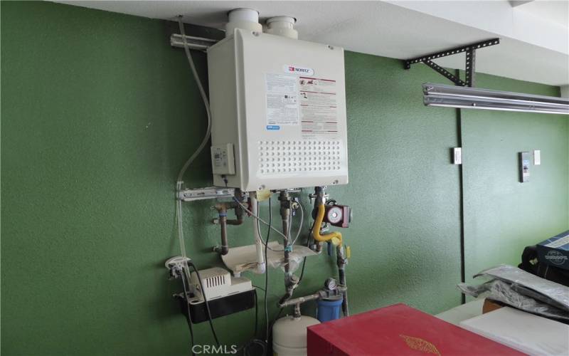 Tankless Water Heating System in Garage.