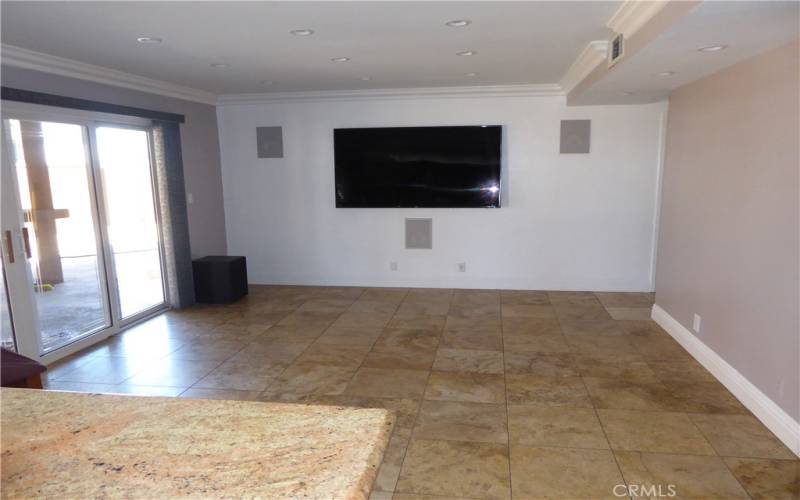 From Kitchen to Family Room with Beautiful Tile Flooring. At back wall turn right to Ground Floor Master Bedroom.