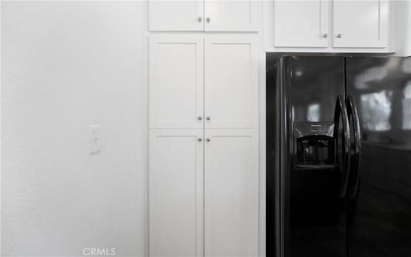 Door To The Hidden Walk-In Pantry