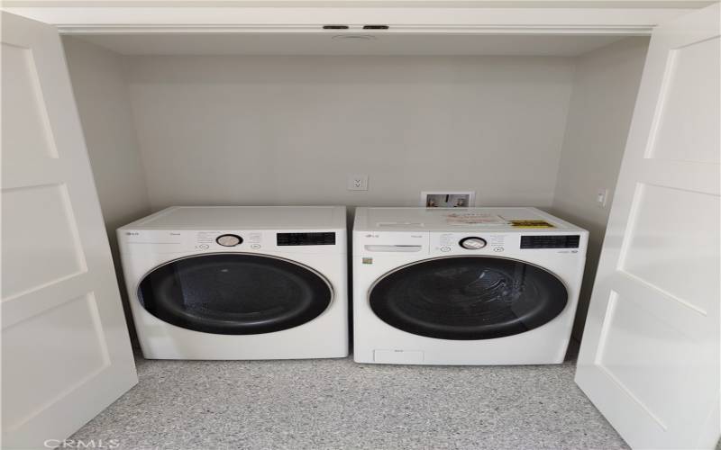 New full size washer and dryer in closet off garage