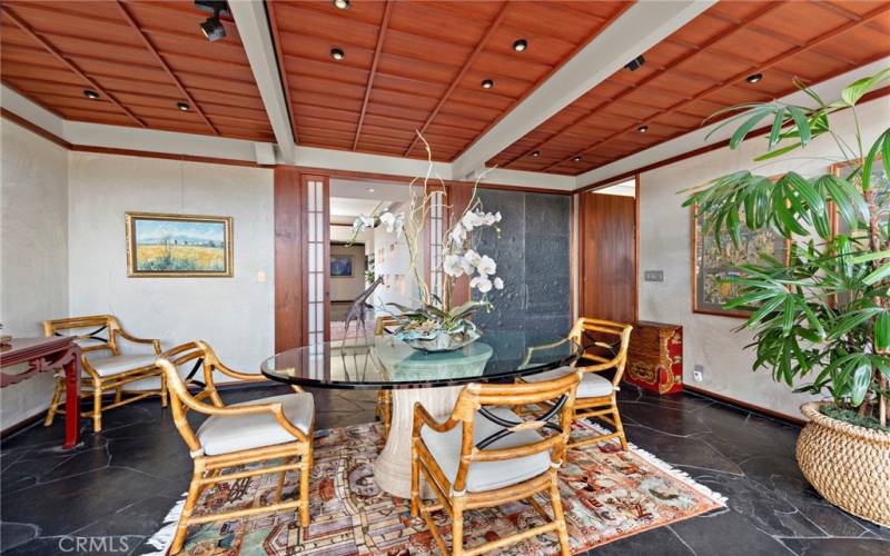 DINING ROOM WITH STONE/TILE CABINETS