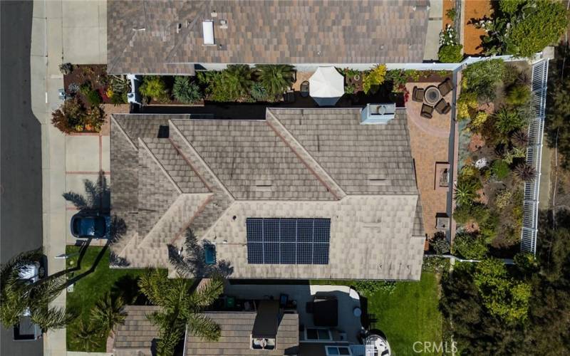 Great view of the Steel roof shingles and the Paid Solar. 10 Panels here! The backyard shot is great too!