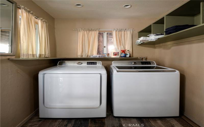 Laundry room from the hallway and has exterior door to parking.