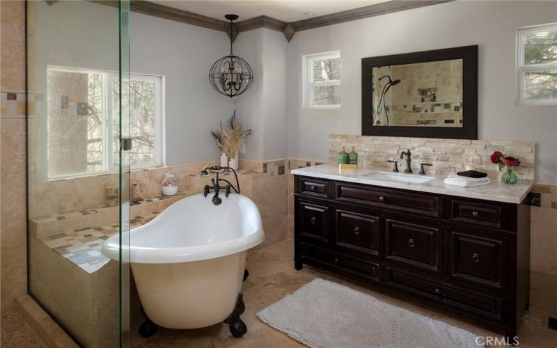 Imagine pampering yourself in a retreat bathroom featuring a clawfoot tub