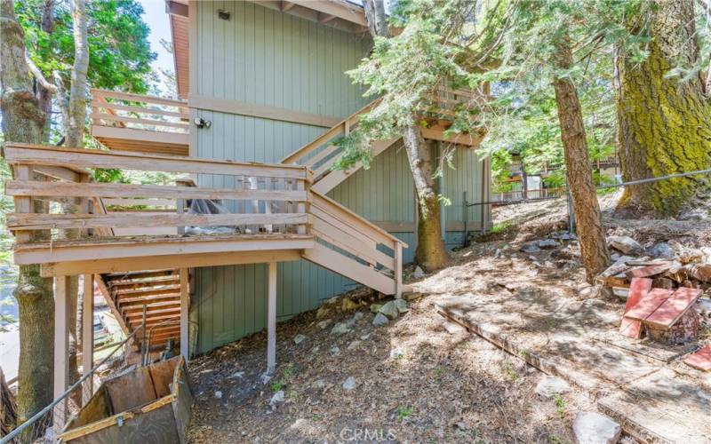 Stairway leading to the front door, this home has access from the 1st & 3rd levels, plus 2 LARGE decks!