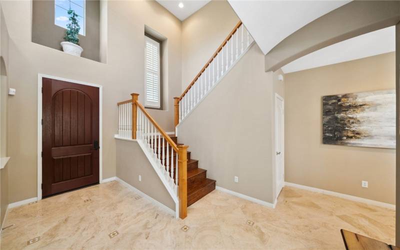 Formal entry with 2 story ceilings