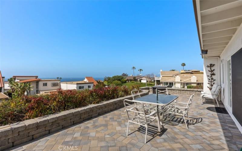 Beautiful paved patio to sit and enjoy the Ocean view