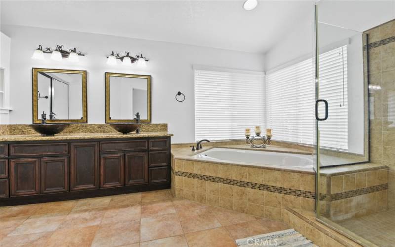 Nicely updated main bathroom with huge walk in closet.