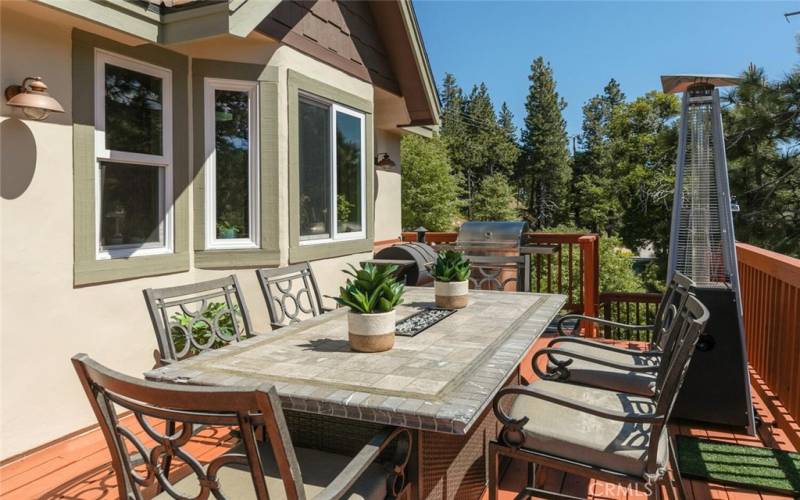 Upper deck dining area with gas piped BBQ