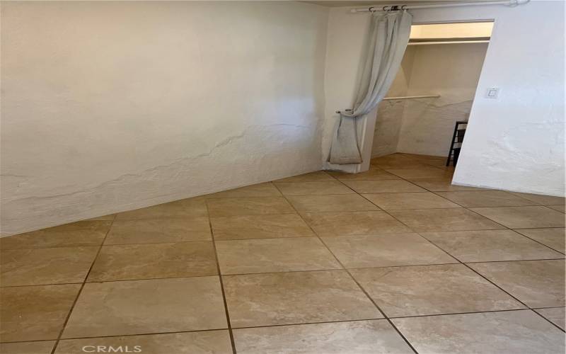 Bedroom with walk-in closet