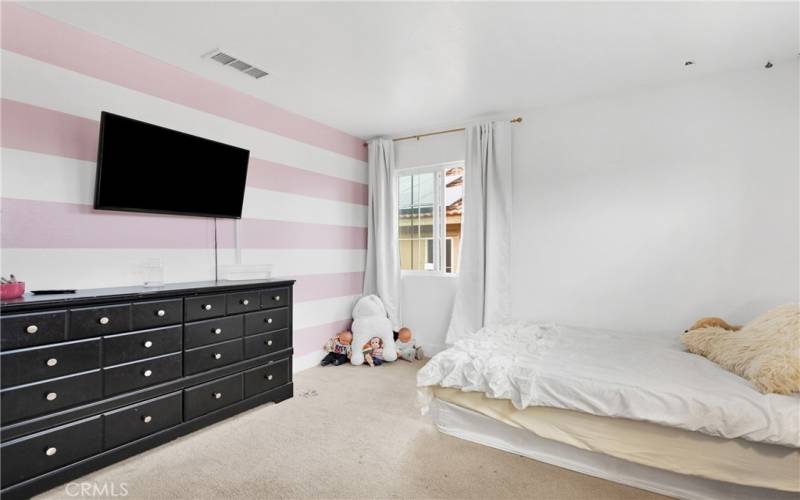 Custom paint decor in bedroom 3.