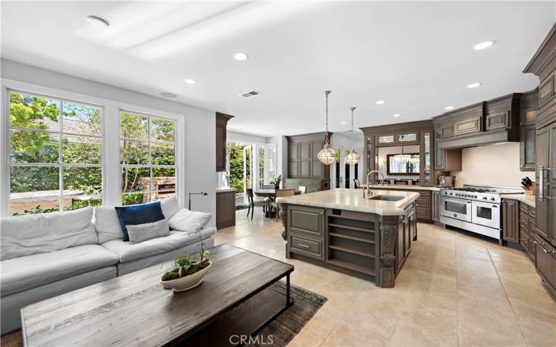 Large family room and redesigned custom kitchen.