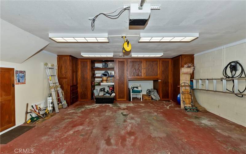 Custom storage in finished garage and EV charger