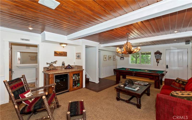 Family room includes a beverage bar