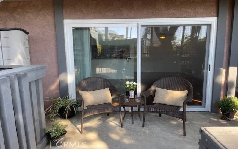 Sliding patio door opens to living room