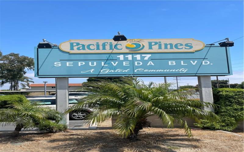 Main entrance to parking at Pacific Pines 1117 Sepulveda Blvd