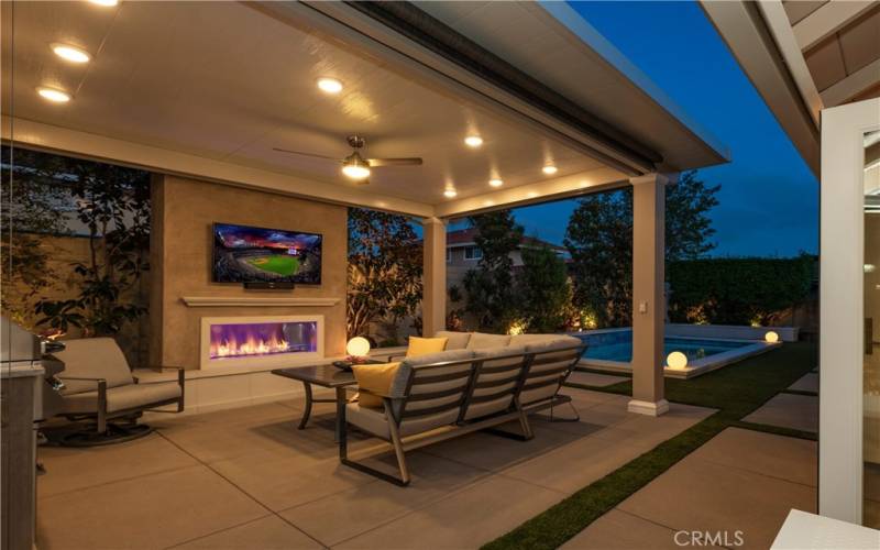 Outdoor Living Area with Electronic Shades and​​‌​​​​‌​​‌‌​​‌​​​‌‌​​​‌​​‌‌​​‌‌​​‌‌​​​​ Lighting
