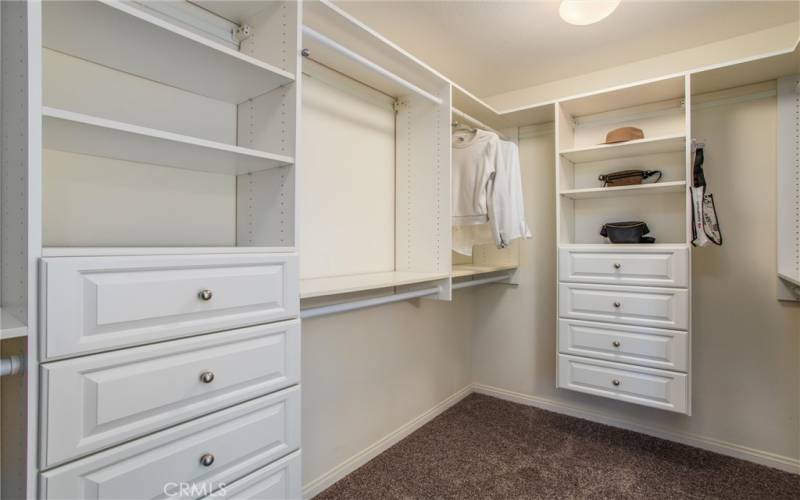 Large primary closet with upgraded custom inserts